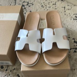 Steven by Steve Madden white slip on sandal